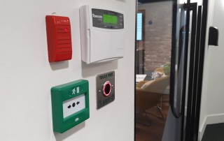 Texecom alarm panel and proximity reader